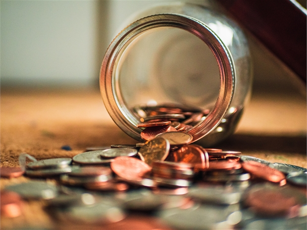 Glasgow Uni SRC Advice Centre Money Finances Spending Coins Spilled Jar
